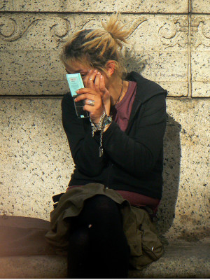 woman sitting on library steps