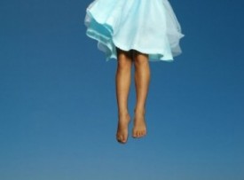 girl leaping into the air